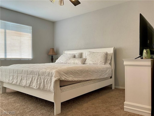 bedroom featuring carpet flooring and ceiling fan