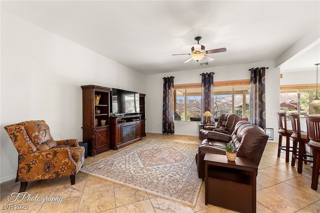 living room with ceiling fan