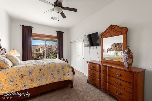 carpeted bedroom featuring ceiling fan and access to exterior