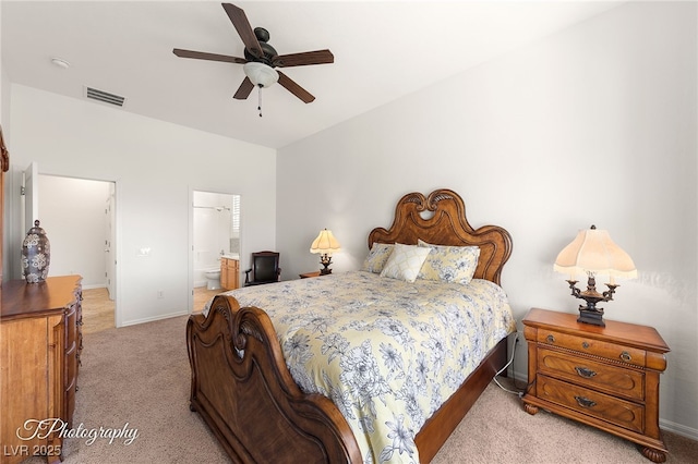 carpeted bedroom featuring connected bathroom and ceiling fan