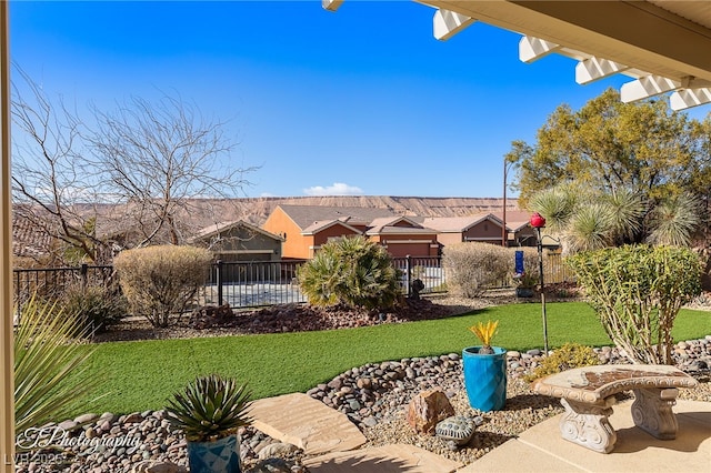 rear view of house with a yard