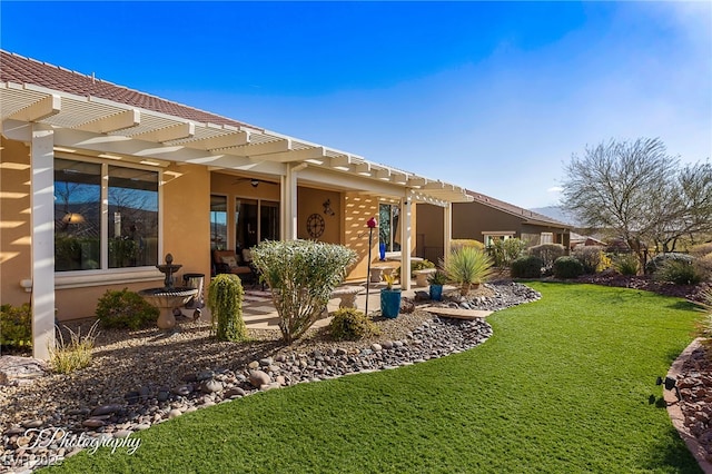 back of property featuring a pergola, a lawn, and a patio