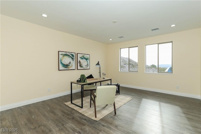 home office featuring dark hardwood / wood-style flooring