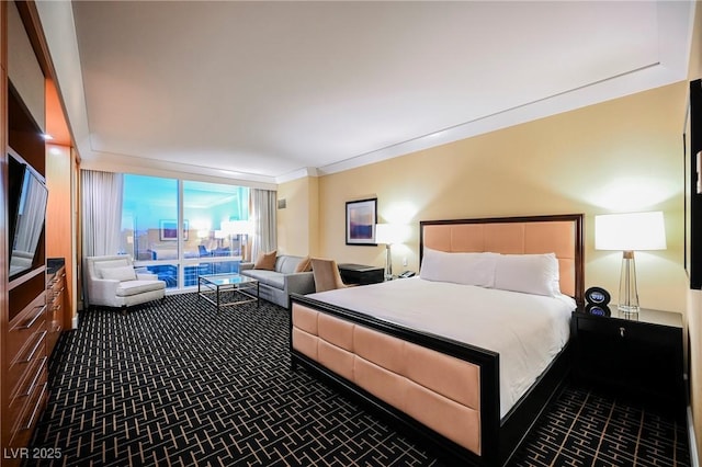 bedroom featuring carpet flooring and crown molding