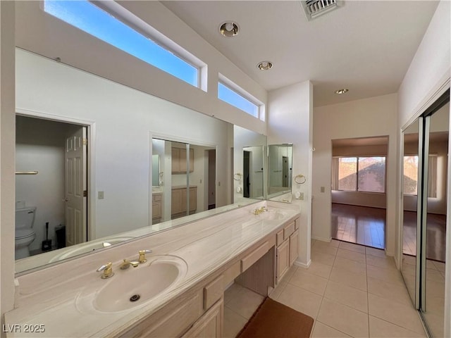 3012 Morning Ridge Dr, Las Vegas, NV 89134 - bathroom featuring plenty of natural light, tile patterned floors, and double vanity