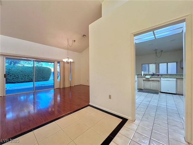 3012 Morning Ridge Dr, Las Vegas, NV 89134 - spare room featuring a chandelier, light tile patterned flooring, and high vaulted ceiling