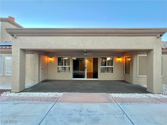3012 Morning Ridge Dr, Las Vegas, NV 89134 - rear view of property with stucco siding, a patio area, and a ceiling fan