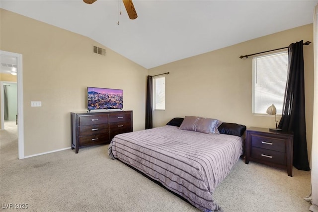 carpeted bedroom featuring vaulted ceiling and ceiling fan