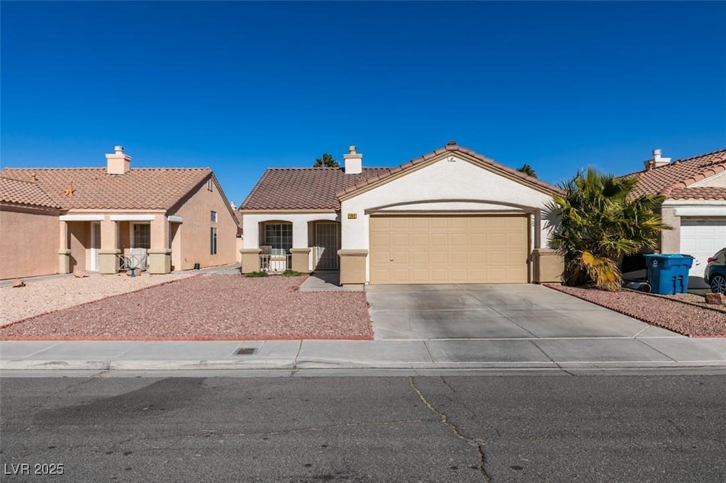 view of front of home with a garage