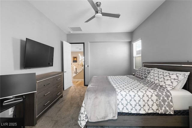 carpeted bedroom with ceiling fan