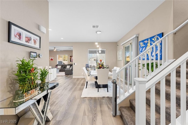 foyer with light hardwood / wood-style floors