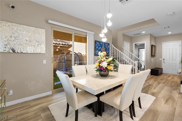 dining room featuring light wood-type flooring