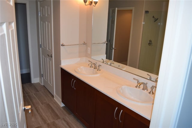 bathroom featuring vanity and walk in shower