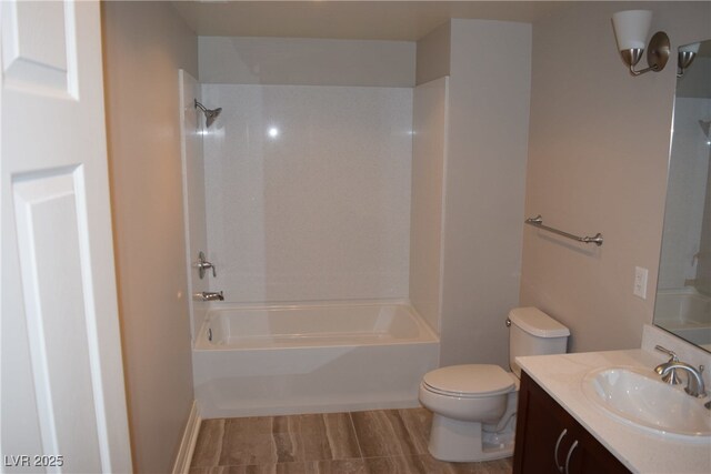 full bathroom featuring vanity, toilet, and shower / tub combination