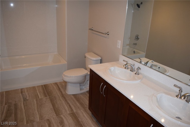 full bathroom with vanity, toilet, and tub / shower combination