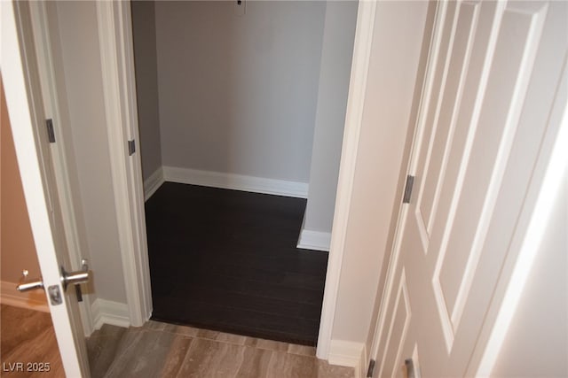 corridor featuring hardwood / wood-style flooring