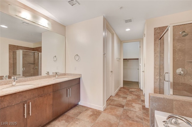 bathroom featuring vanity and walk in shower