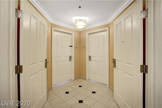 doorway with light tile patterned floors and ornamental molding