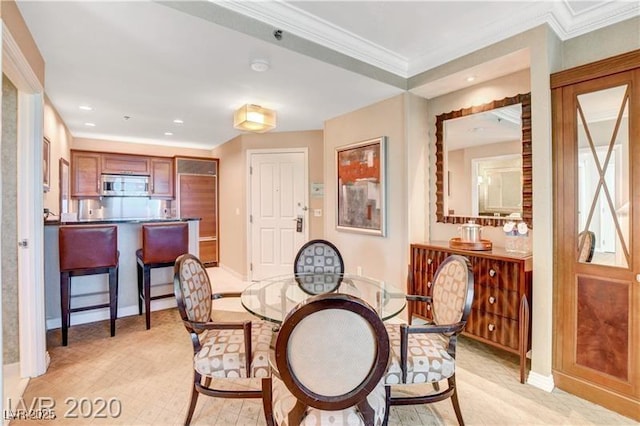 dining room with crown molding