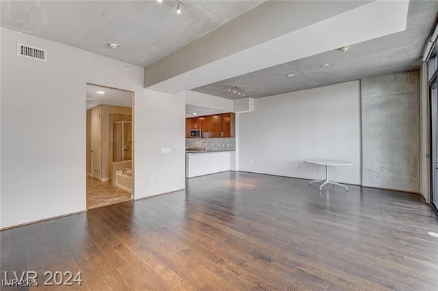 unfurnished room featuring hardwood / wood-style flooring