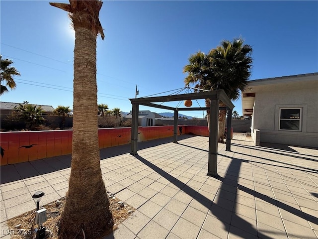 view of patio / terrace featuring a gazebo and a hot tub