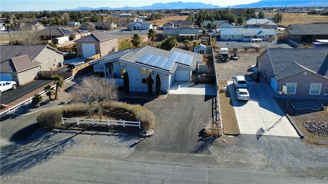 drone / aerial view featuring a mountain view