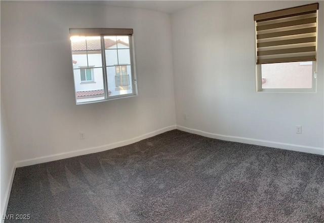 unfurnished room with carpet floors