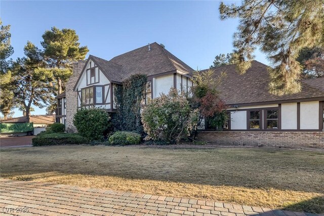 view of front of home with a front yard