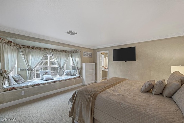 bedroom featuring carpet floors and crown molding