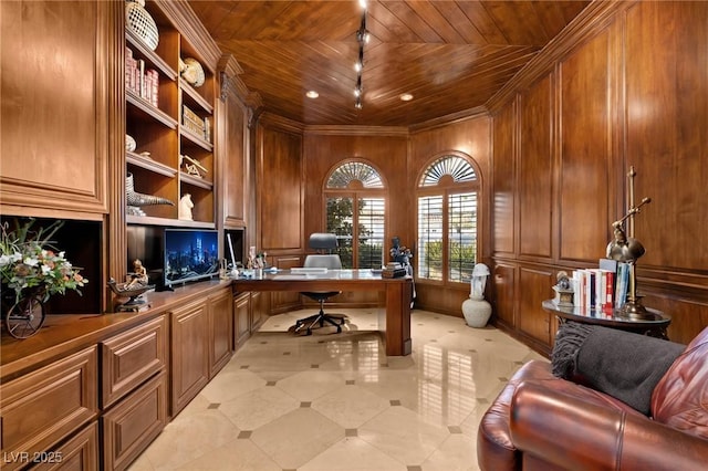 office space featuring built in desk, wood walls, and wood ceiling