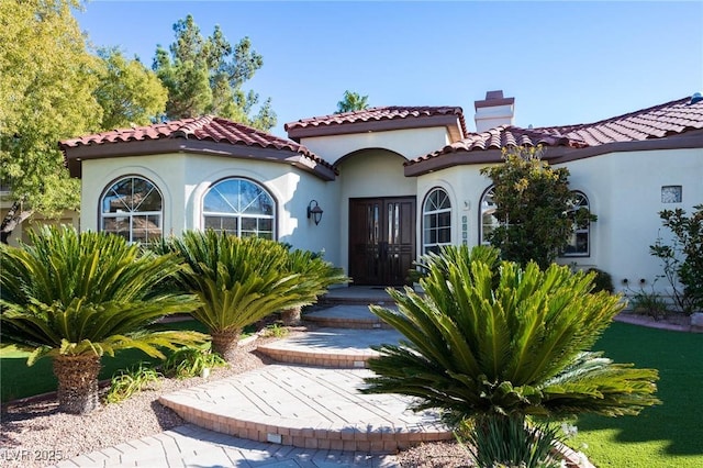 view of mediterranean / spanish house