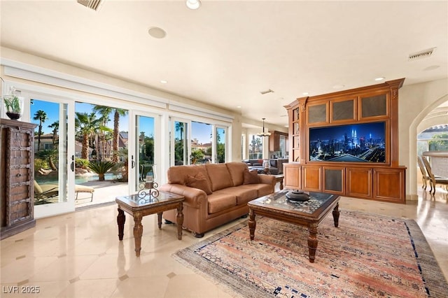 living room featuring plenty of natural light