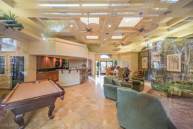 game room featuring pool table, ceiling fan, a high ceiling, and coffered ceiling