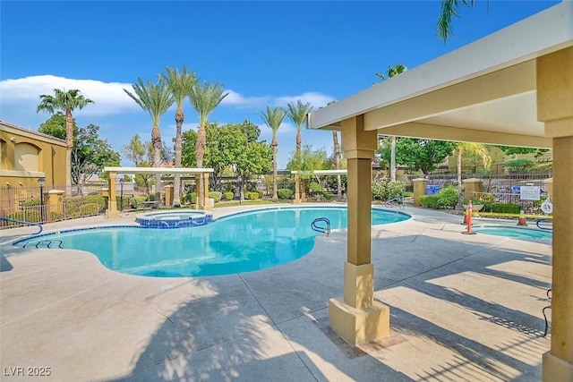 view of swimming pool featuring a patio