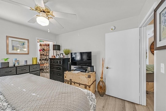 bedroom featuring ceiling fan and light hardwood / wood-style floors