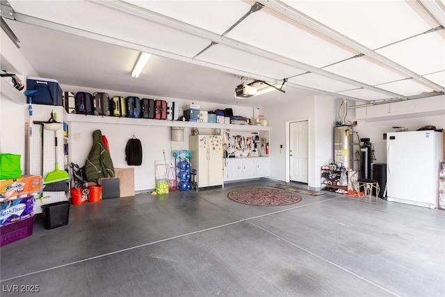 garage featuring white fridge, a garage door opener, and gas water heater