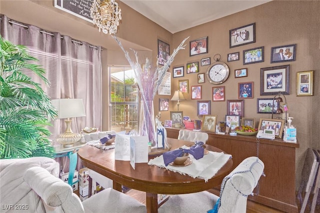 dining space featuring an inviting chandelier