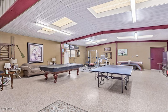 game room with lofted ceiling, speckled floor, and billiards