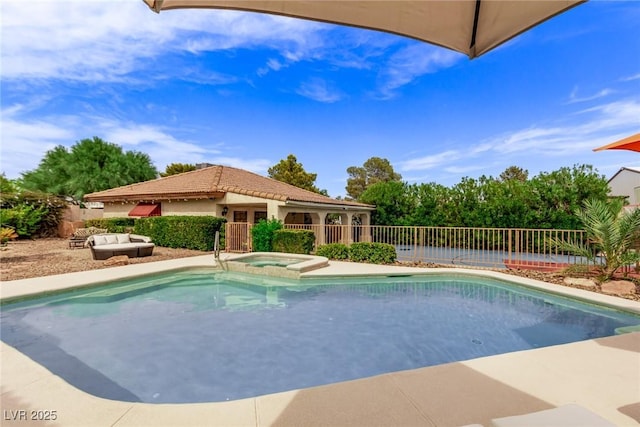 view of swimming pool featuring an in ground hot tub