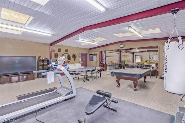 interior space featuring pool table and vaulted ceiling