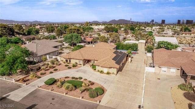 aerial view with a residential view and a mountain view