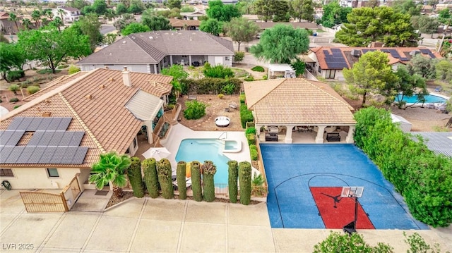 view of swimming pool with a residential view