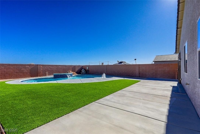 view of yard with a fenced in pool and a patio area