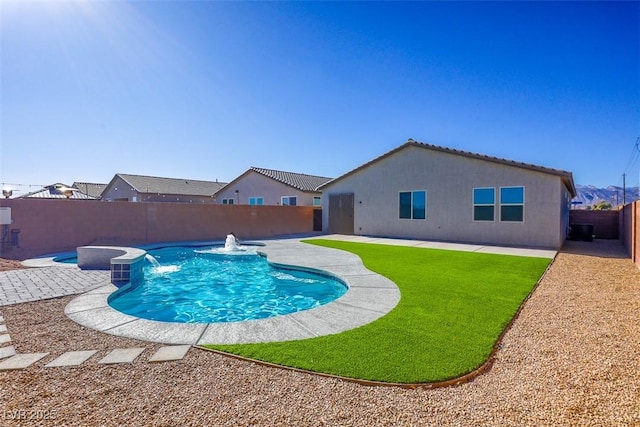 view of swimming pool featuring a patio and pool water feature