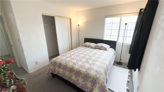 carpeted bedroom featuring a closet