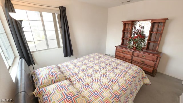 bedroom featuring carpet