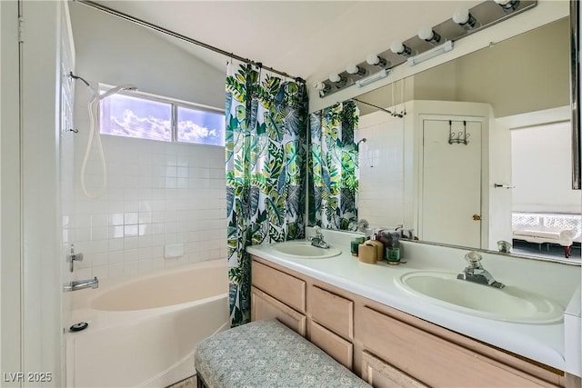 bathroom with vanity and shower / tub combo