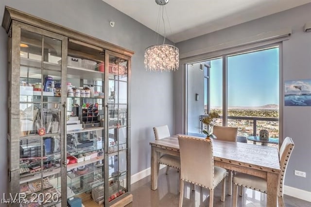 dining area with a chandelier