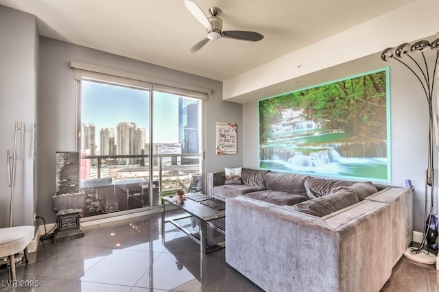 tiled living room featuring ceiling fan