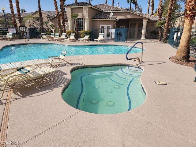 view of pool featuring a patio area